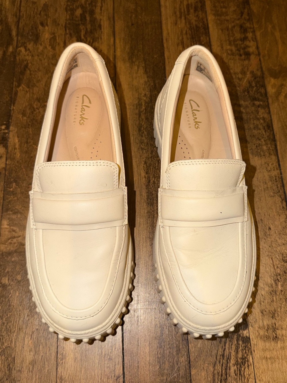 Clarks Cream Leather Penny Loafers with Pebbled Outsole